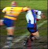 Jim Dymock smashes Adam MacDougall really high - ref does nothing.