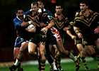 Andrew Johns and Robbie Kearns loom in support for Scott Hill.