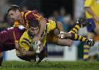 Danny Buderus makes a thumping tackle.