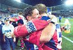 Robbie O'Davis and Adam MacDougall celebrate the win.