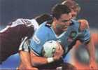 Mark Hughes gets tackled on Origin debut.