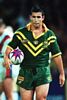 Andrew Johns with the ball ...