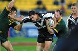 Adam MacDougall makes a tackle on David Vaealiki.