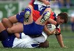 Josh Perry scores a try.