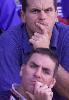 Coach Michael Hagan and Paul Harragon watch the game.