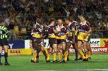 The Broncos celebrate a try.