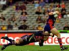 Darren Albert gets away from another poor Marcus Bai tackle.