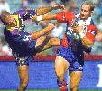 Adam MacDougall easily fends off Matt Geyer.