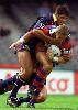 Bill Peden tackles Stephen Kearney.