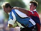 Andrew Johns tackling again.