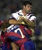 Ian Rubin is tackled by Sean Rudder.