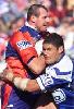 Bill Parsons is tackled.