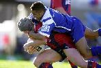 Wobbly old Justin Ryder is tackled.