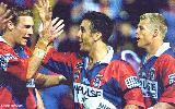 Andrew Johns celebrates a try.