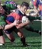 Andrew Johns scores one of his 4 tries.
