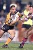 Ken McGuiness looks for a gap.