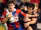 Matthew Gidley gets away from Ryan Girdler.