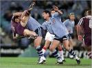 Andrew Johns lifts up Darren Lockyer ...