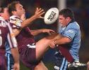 Danny Buderus thumps Gorden Tallis who loses it.