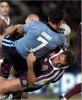 Andrew Johns is thumped!