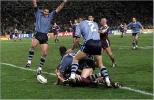 Timana Tahu congratulates Shaun Timmins on a try.
