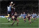 Timana Tahu leaps up to take a bomb.