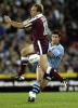 Gorden Tallis can't charge down an Andrew Johns kick.
