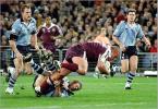 Matthew Gidley watches Brett Hodgson pull down Shane Webcke too late.