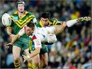 Andrew Johns up-ends a Great Britain player.