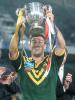 Andrew Johns hoists his first trophy up as Australian captain!