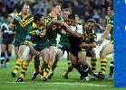 Danny Buderus coming up with some desperate defence on Matt Utai.