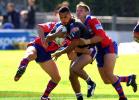 Frances Meli is tackled by Daniel Abraham.