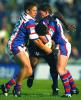 Marcus Bai is sandwiched by Daniel Abraham and Matthew Gidley.
