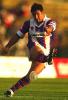 Andrew Johns kicking for goal.
