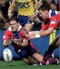 Matthew Gidley crosses in the big grand final replay ...