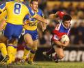 Andrew Johns goes through sort of.