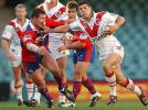 Trent Barrett gets past Steve Simpson.