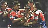 Andrew Johns crosses for his first try, to tie the scores at 8 all.