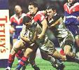 Robbie Paul lunges for the line, with John Morris in tow, to score right before the halftime break.