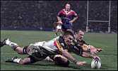 Michael Withers forces it for another Bulls try (thanks to Stuart Cummings foot).