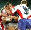 Matthew Gidley puts paid to Andrew Lomu.