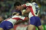 Chris Flannery is tackled.