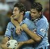 Anthony Minichiello and Timana Tahu celebrate New South Wale's second try.