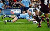 Ben Kennedy forces the ball ...