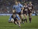 Matthew Gidley dives over ...