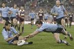 Timana Tahu just beats Matthew Gidley to score a try.
