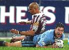 Shannon Hegarty can't stop the second Timana Tahu try.