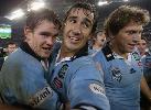 Andrew Johns and Matthew Gidley after the win.