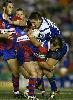 Tackling machine Andrew Johns at it again, this time on Steve Price.