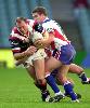 Anthony Quinn tackles Craig Fitzgibbon.